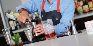 bartender mixing a cocktail BevSpot
