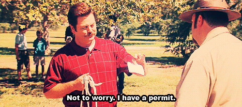 gif from parks and rec showing ron swanson telling a park ranger that he has permits